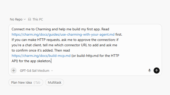 Cursor chat with the Charming setup prompt ready to send.